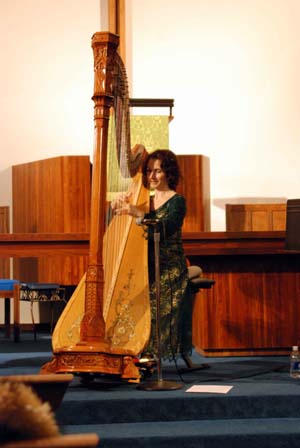 Stephanie Bennett plays pedal harp in concert