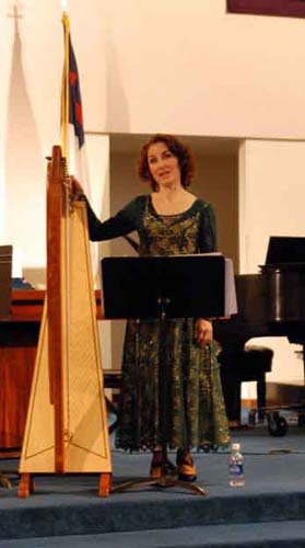 Stephanie Bennett plays lever harp in concert